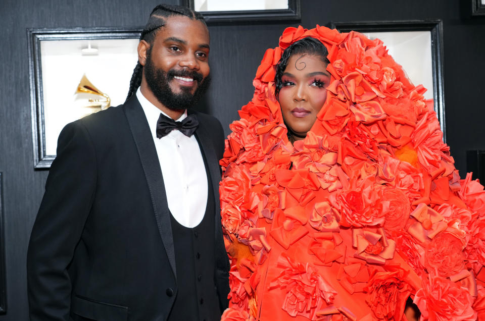 Myke Wright and Lizzo a thet 65th GRAMMY Awards. (Kevin Mazur / Getty Images)