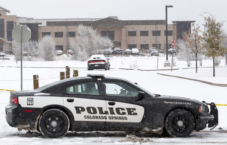 A Colorado Springs Police car blocks the entrance outside the Planned Parenthood clinic a day after a gunman opened fire in Colorado Springs, Colorado November 28, 2015. REUTERS/Isaiah J. Downing