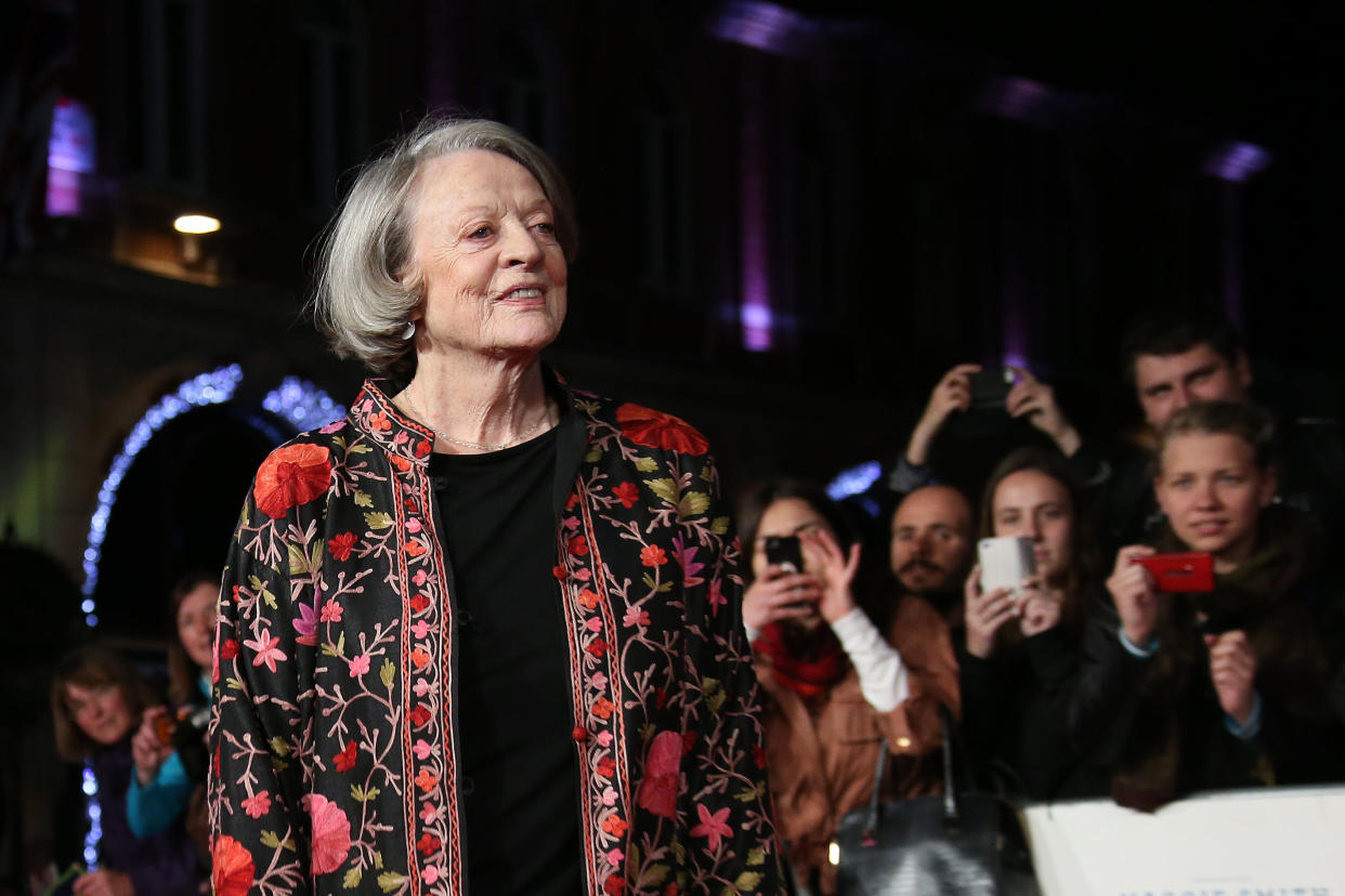 Dame Maggie Smith poses for photographers upon arrival at the premiere of the film 'The Lady In The Van', as part of the London film festival in London, Tuesday, Oct. 13, 2015. (Photo by Joel Ryan/Invision/AP)