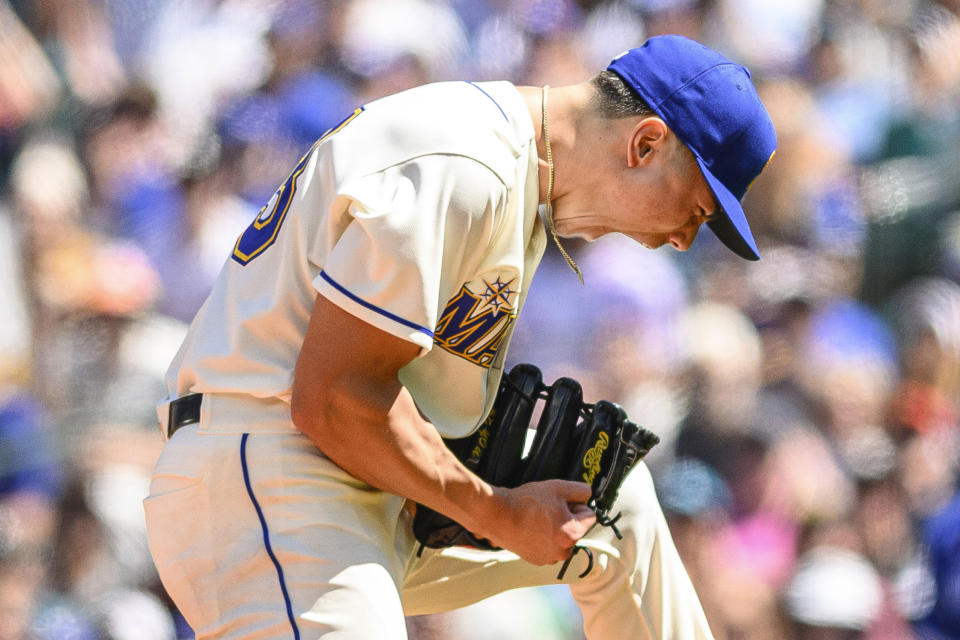 Seattle Mariners starting pitcher Bryan Woo reacts after a double play ended the fifth inning of a baseball game against the Toronto Blue Jays, Sunday, July 23, 2023, in Seattle. (AP Photo/Caean Couto)