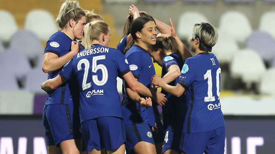 Sam Kerr is seen celebrating Chelsea's win over Wolfsburg with teammates.