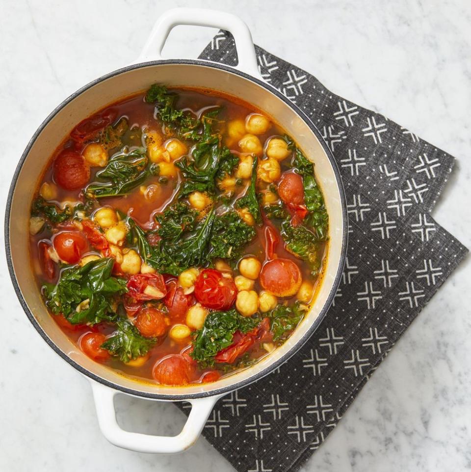 <p>High-fiber and high-protein chickpeas serve as the base for this colorful, hearty stew.</p><p><em>Get the <a href="https://www.womansday.com/food-recipes/a32675058/chickpea-and-kale-stew-recipe/" rel="nofollow noopener" target="_blank" data-ylk="slk:Chickpea and Kale Stew recipe;elm:context_link;itc:0;sec:content-canvas" class="link ">Chickpea and Kale Stew recipe</a>.</em></p>