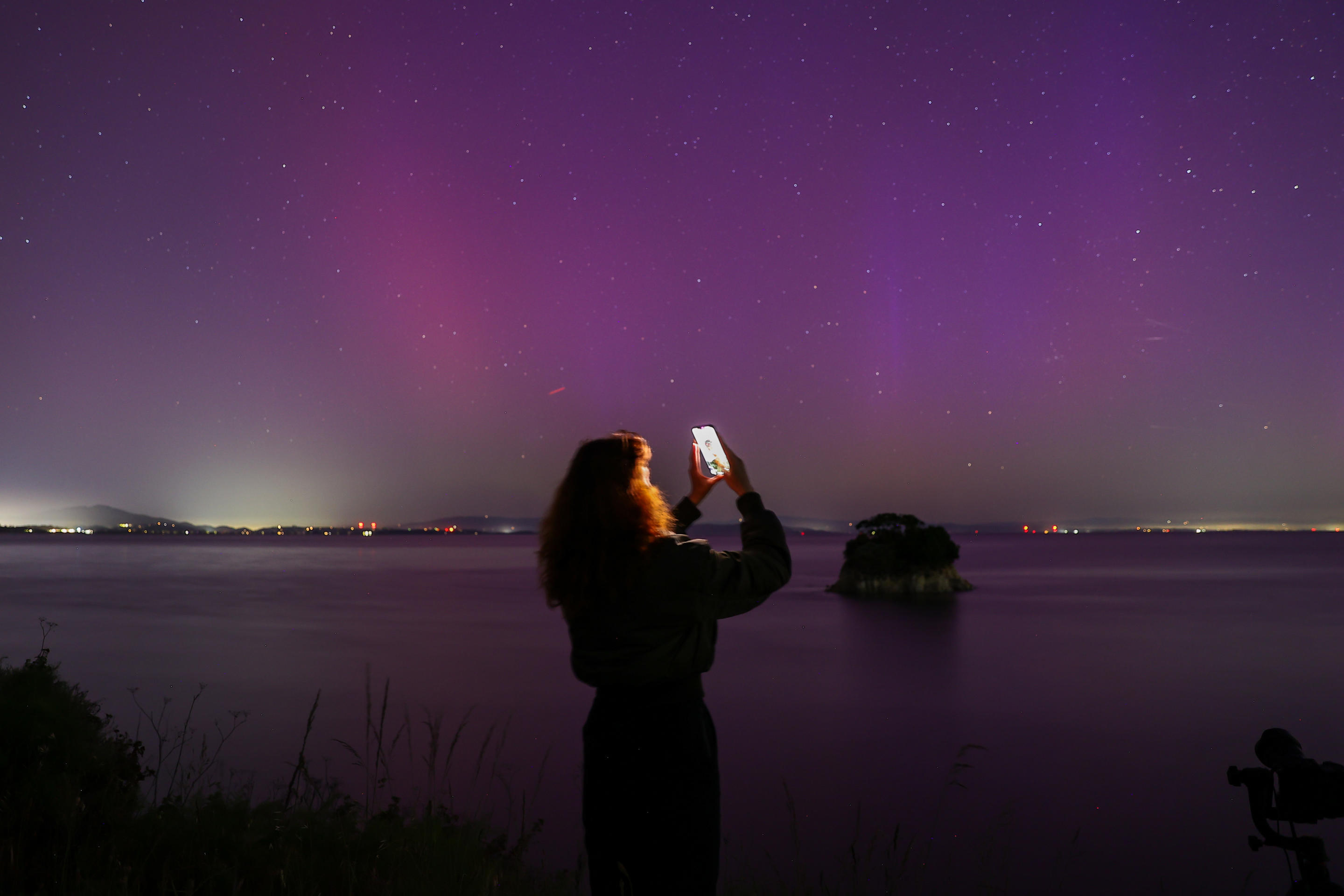 CALIFORNIA, USA - MAY 11: Northern Lights (Aurora Borealis) illuminate the sky of San Francisco North Bay as seen from China Camp Beach in San Rafael, California, United States on May 11, 2024. (Photo by Tayfun Coskun/Anadolu via Getty Images)