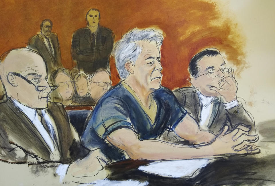 In this courtroom artist's sketch, defendant Jeffrey Epstein, center, sits with attorneys Martin Weinberg, left, and Marc Fernich during his arraignment in New York federal court, Monday, July 8, 2019.  (Elizabeth Williams via AP)