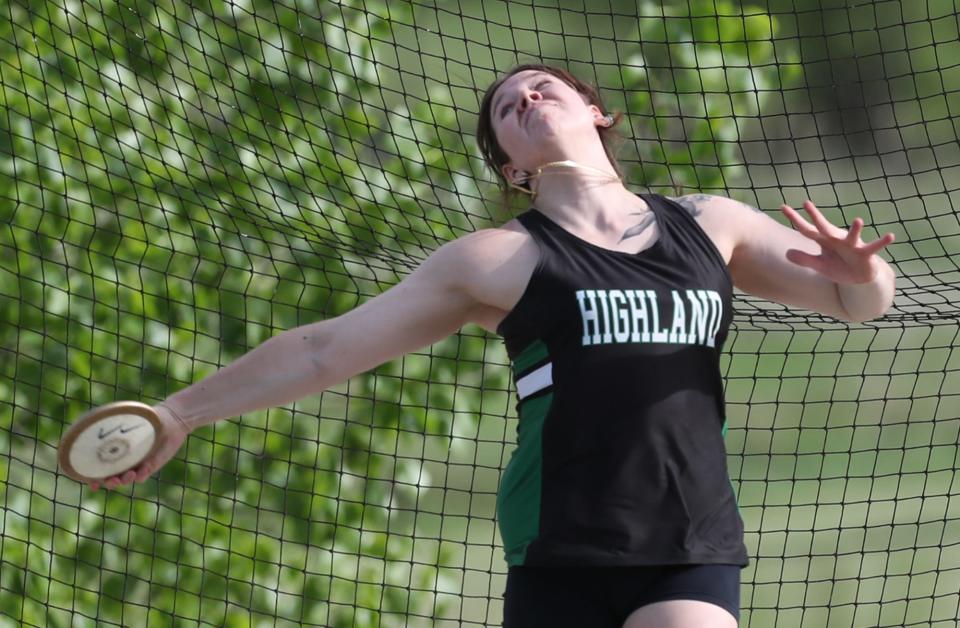 Highland's Sierra Podolan throws a discus during the Suburban League American Conference track championships at Tallmadge High School on Wednesday, May 8, 2024.