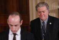 White House Chief Strategist Steve Bannon (R) arrives with Senior Advisor Stephen Miller (L) a for a news conference by U.S. President Donald Trump at the White House in Washington, U.S., February 16, 2017. REUTERS/Carlos Barria