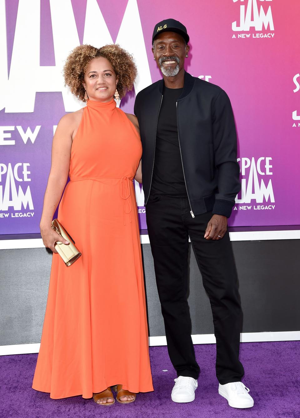 Bridgid Coulter and Don Cheadle attend the Premiere of Warner Bros "Space Jam: A New Legacy" at Regal LA Live on July 12, 2021 in Los Angeles, California.