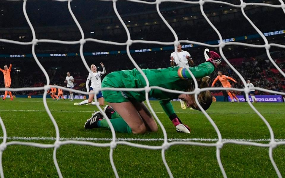 England's goalkeeper #01 Mary Earps reacts following the second goal scored by Netherlands' striker #07 Lineth Beerensteyn (rear L) during the UEFA Women's Nations League Group A
