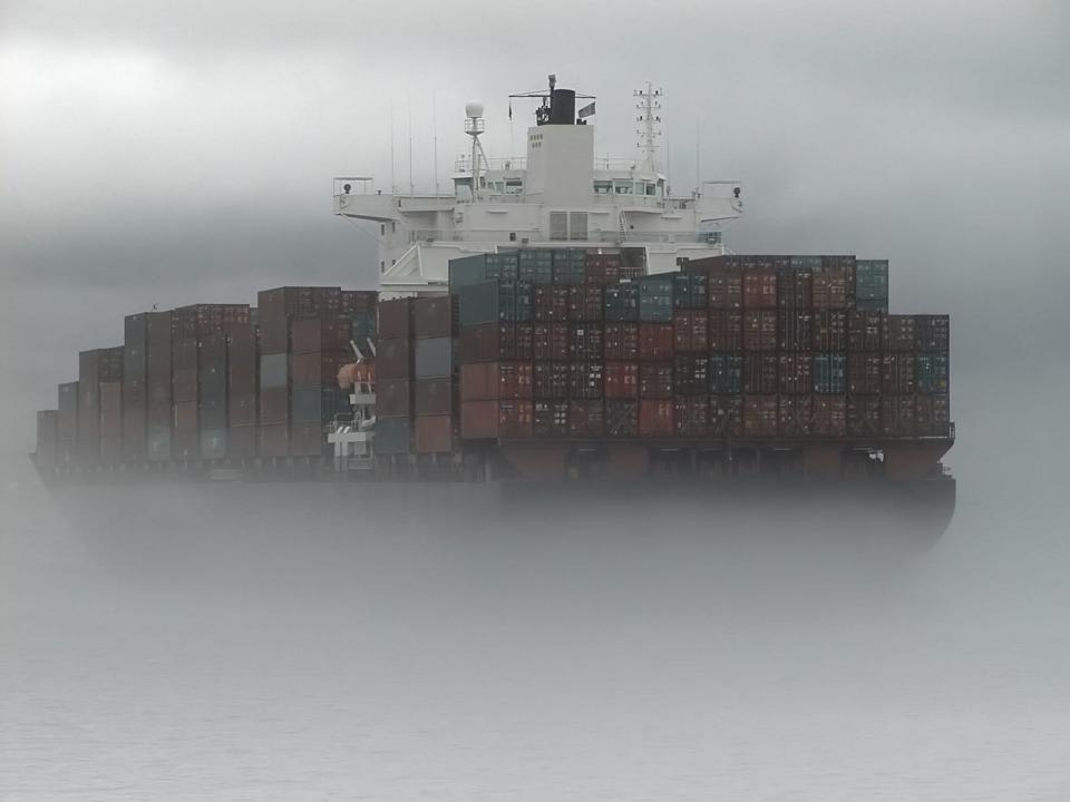 Cargo Ship seen through fog