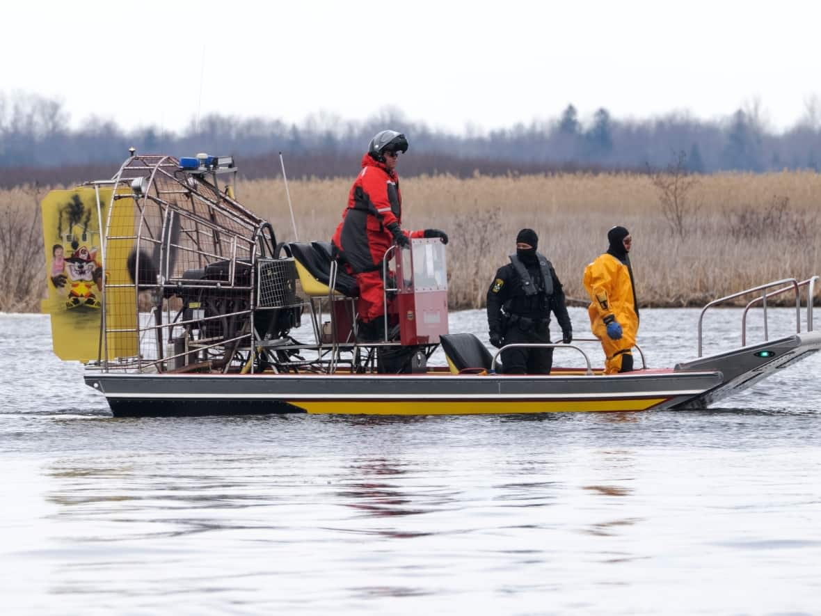 Searchers recovered eight bodies from the St. Lawrence River near the Quebec-Ontario border as of Friday. On Saturday, searchers continued looking for a missing boater.  (Ryan Remiorz/The Canadian Press - image credit)