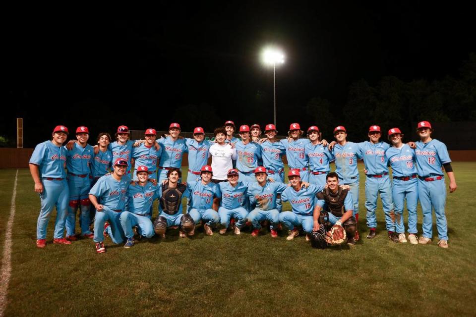 CHARLOTTE, NC - MAY 10: Charlotte Catholic Cougars pose together for a photo after defeating the Myers Park Mustangs in the second round of the NCHSAA baseball playoffs at Myers Park High School in Charlotte, NC on May 10, 2024.