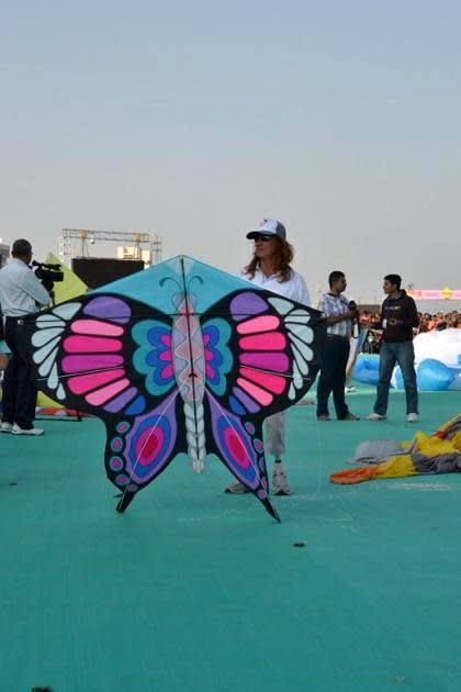 A butterfly kite readies for takeoff