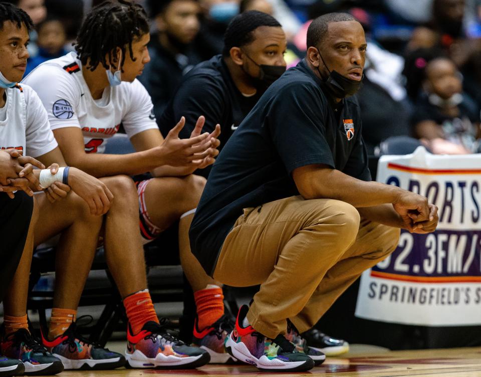 Lanphier boys basketball head coach Blake Turner watches as the Lions take on Sacred Heart-Griffin in the first half during the Showcase Saturday at the Bank of Springfield Center  in Springfield, Ill., Saturday, December 4, 2021. [Justin L. Fowler/The State Journal-Register] 