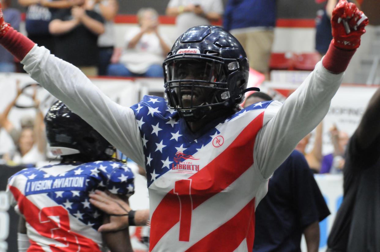 Salina Liberty's Demarius Washington (1) celebrates after the Liberty defeated Omaha in Champions Bowl VII on Saturday at Tony's Pizza Events Center.