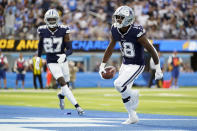 Dallas Cowboys strong safety Damontae Kazee, right, celebrates after intercepting a pass during the second half of an NFL football game against the Los Angeles Chargers Sunday, Sept. 19, 2021, in Inglewood, Calif. (AP Photo/Ashley Landis)