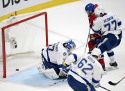 Montreal Canadiens left wing Max Pacioretty (67) scores the winning goal against Tampa Bay Lightning goalie Kristers Gudlevskis (37) during third period National Hockey League Stanley Cup playoff action on Tuesday, April 22, 2014 in Montreal. (AP Photo/The Canadian Press, Ryan Remiorz)