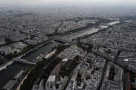 View from the third level and top of the Eiffel Tower of the Seine river and the north side of Paris during the opening up of the top floor of the Eiffel Tower, Wednesday, July 15, 2020 in Paris. The top floor of Paris' Eiffel Tower reopened today as the 19th century iron monument re-opened its first two floors on June 26 following its longest closure since World War II. (AP Photo/Francois Mori)