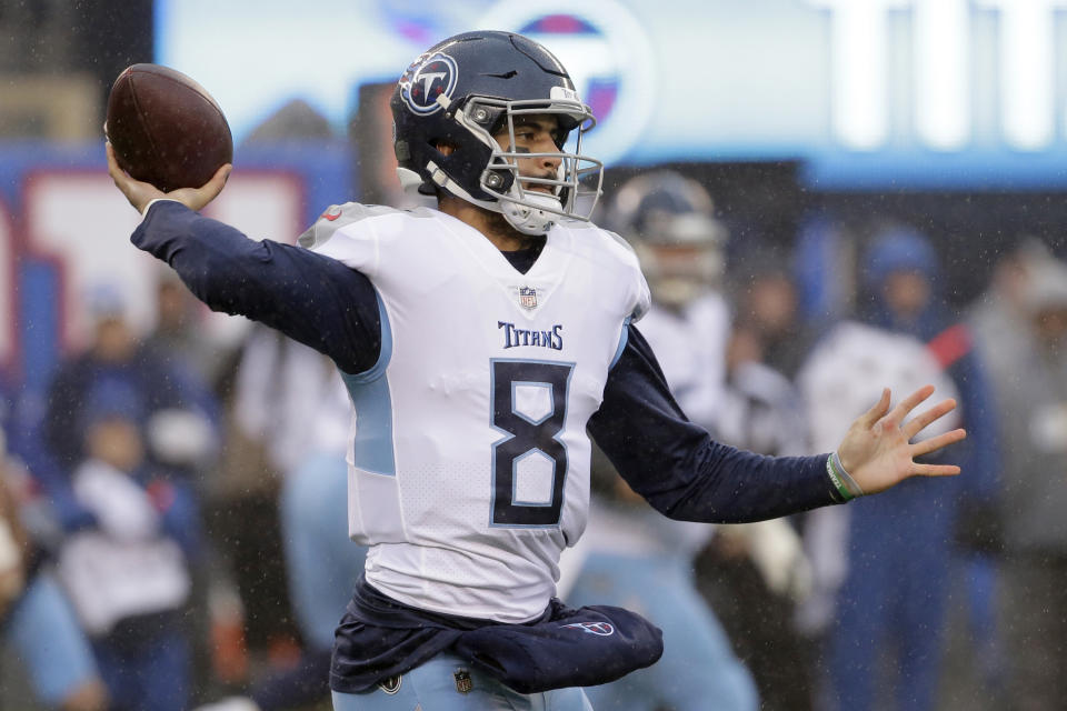 Tennessee Titans quarterback Marcus Mariota threw a heck of a block against the Giants. (AP)