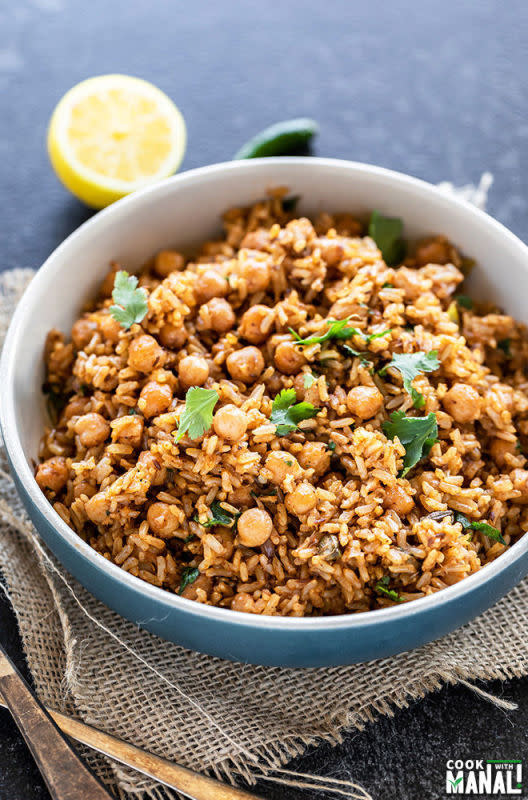 <p>Cook with Manali</p><p>This Instant Pot brown rice chana pulao is an easy one-pot pulao made with chickpeas, brown rice and spices. The perfect meal for busy days, also vegan and gluten-free.</p><p><strong>Get the recipe: <a href="https://www.cookwithmanali.com/instant-pot-brown-rice-chana-pulao/" rel="nofollow noopener" target="_blank" data-ylk="slk:Instant Pot Brown Rice Chana Pulao;elm:context_link;itc:0;sec:content-canvas" class="link rapid-noclick-resp">Instant Pot Brown Rice Chana Pulao</a></strong></p>