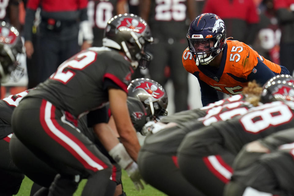 Denver Broncos outside linebacker Bradley Chubb, right, looks over the line as Tampa Bay Buccaneers quarterback Tom Brady, left, starts a play during the second half of an NFL football game Sunday, Sept. 27, 2020, in Denver. (AP Photo/Jack Dempsey)