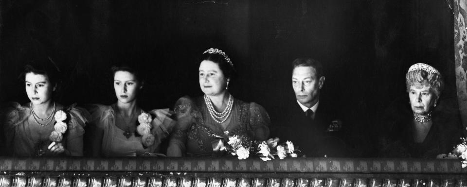 <p>A rare photo of then-Princess Elizabeth attending the ballet with her sister, parents, and grandmother. This was taken at the reopening of the Royal Opera House at the end of World War II.</p>