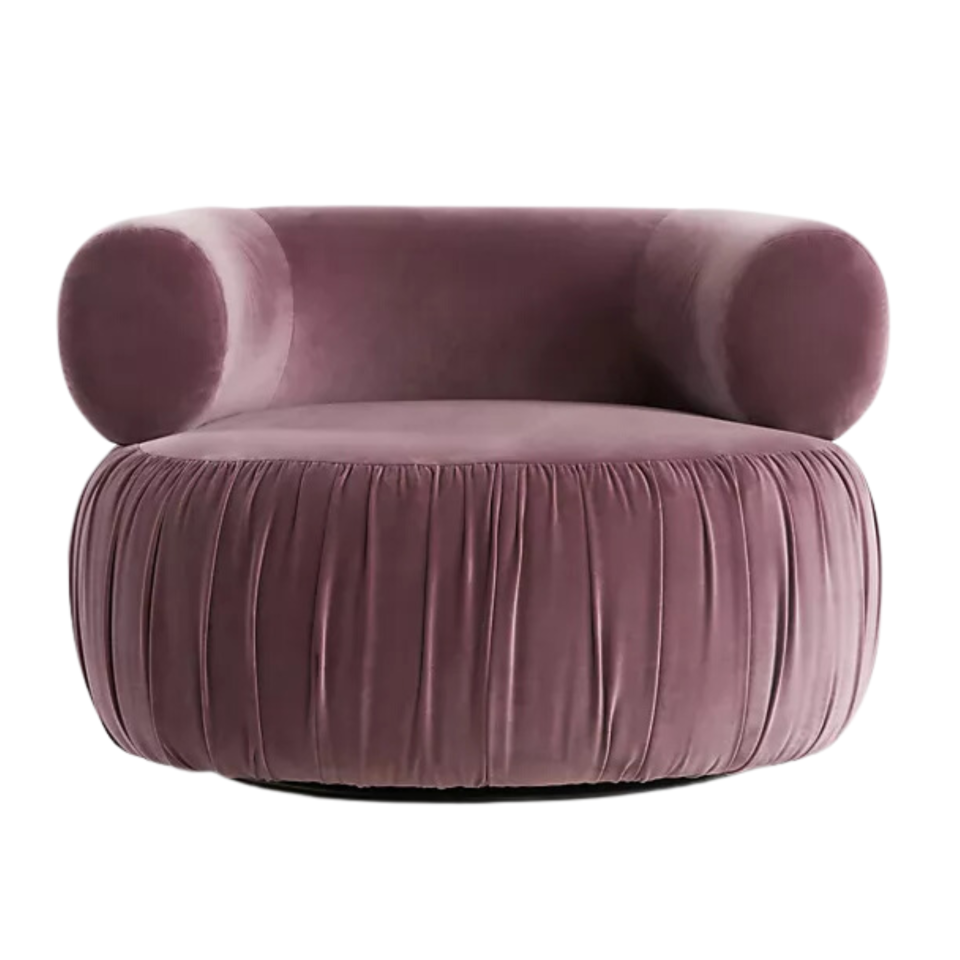 A dark purple velvet plush accent chair