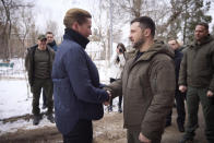 In this photo provided by the Ukrainian Presidential Press Office, Danish Prime Minister Mette Frederiksen, left, and Ukrainian President Volodymyr Zelenskyy shake hands during their meeting in Mykolaiv, Ukraine, Monday, Jan. 30, 2023. (Ukrainian Presidential Press Office via AP)