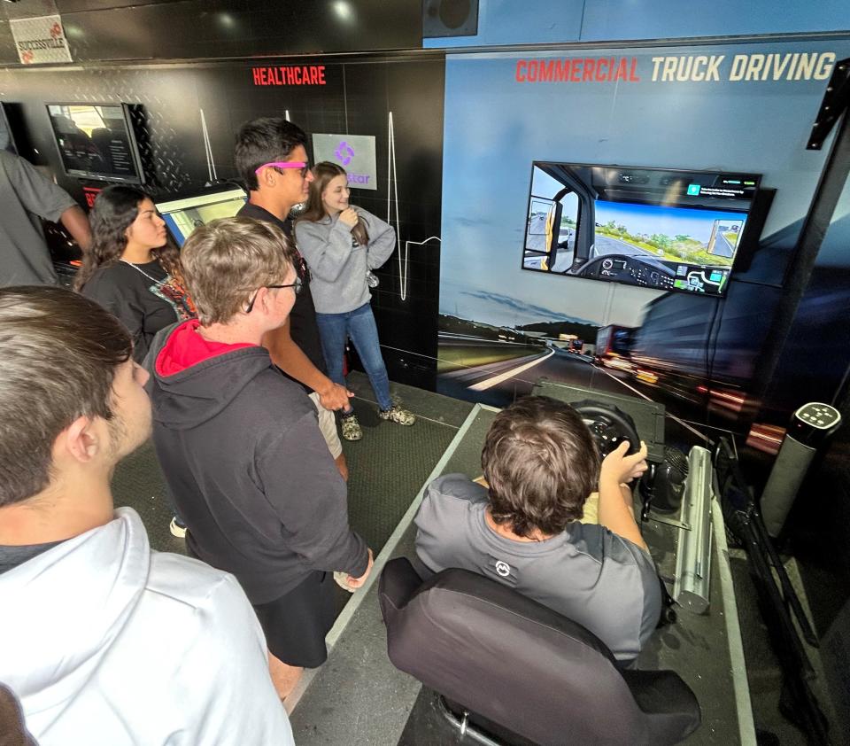Skilled trade simulations aboard the Be Pro Be Proud mobile workshop include commercial truck driving.