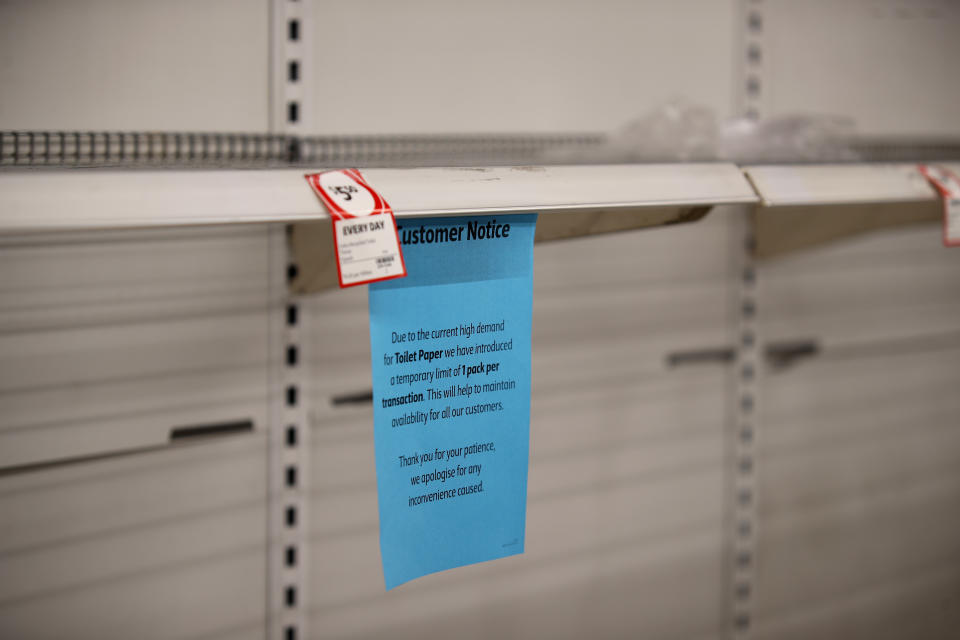 Empty toilet paper shelves at Coles supermarket in Adelaide, Friday, March 13, 2020.  Source: AAP Image