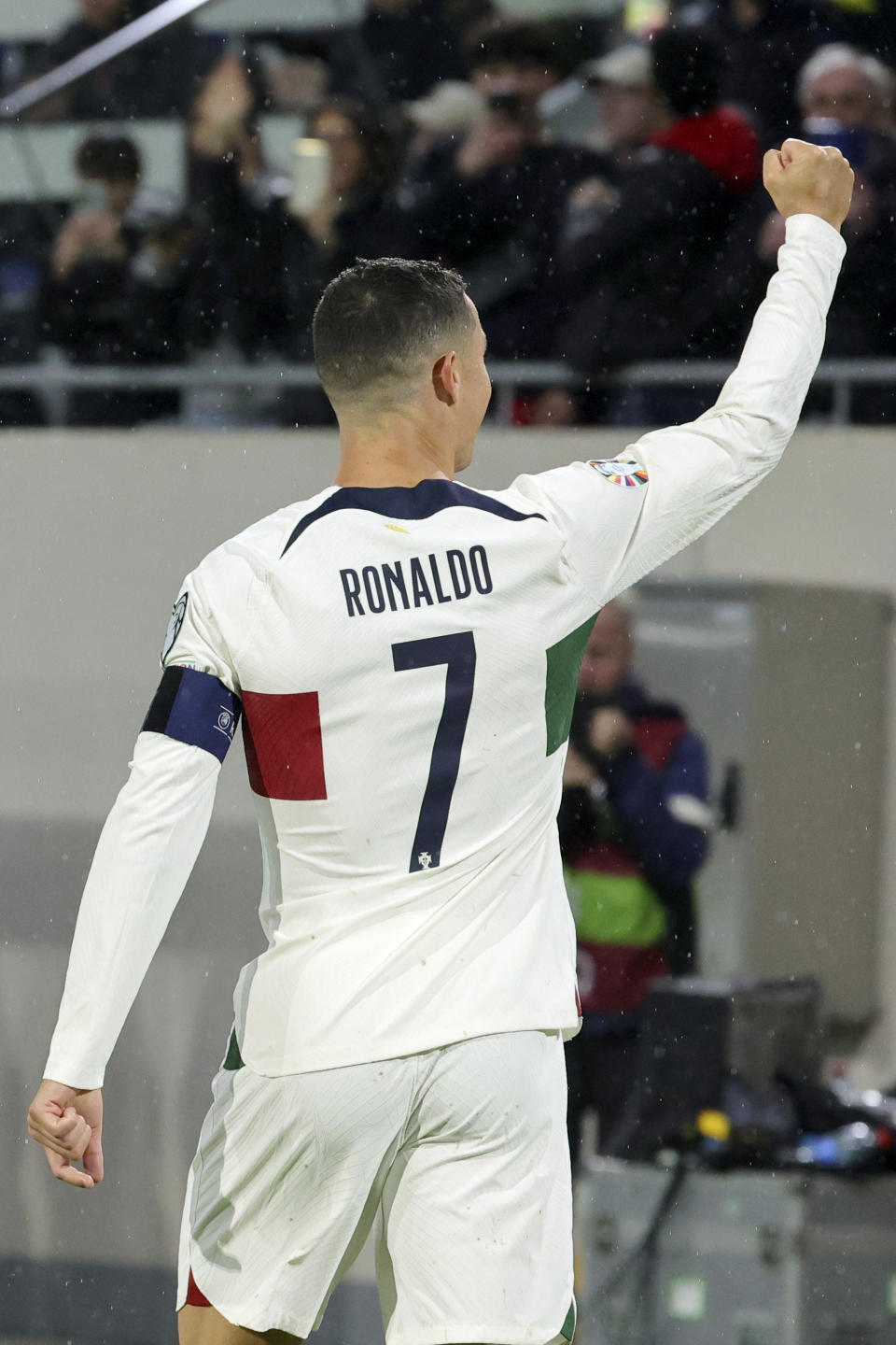 Portugal's Cristiano Ronaldo celebrates after scoring the opening goal during the Euro 2024 group J qualifying soccer match between Luxembourg and Portugal at the Stade de Luxembourg in Luxembourg, Sunday, March 26, 2023. (AP Photo/Olivier Matthys)