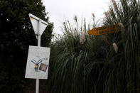 A tribute to Haji-Daoud Nabi, originally from Afghanistan, who was killed in the Christchurch shootings, is hung outside his property in Christchurch, New Zealand March 31, 2019. REUTERS/Edgar Su