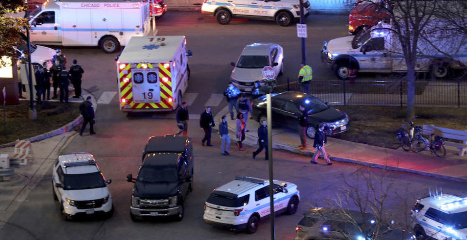 Police and emergency personnel at Chicago’s Mercy Hospital after the shooting (Picture: PA)