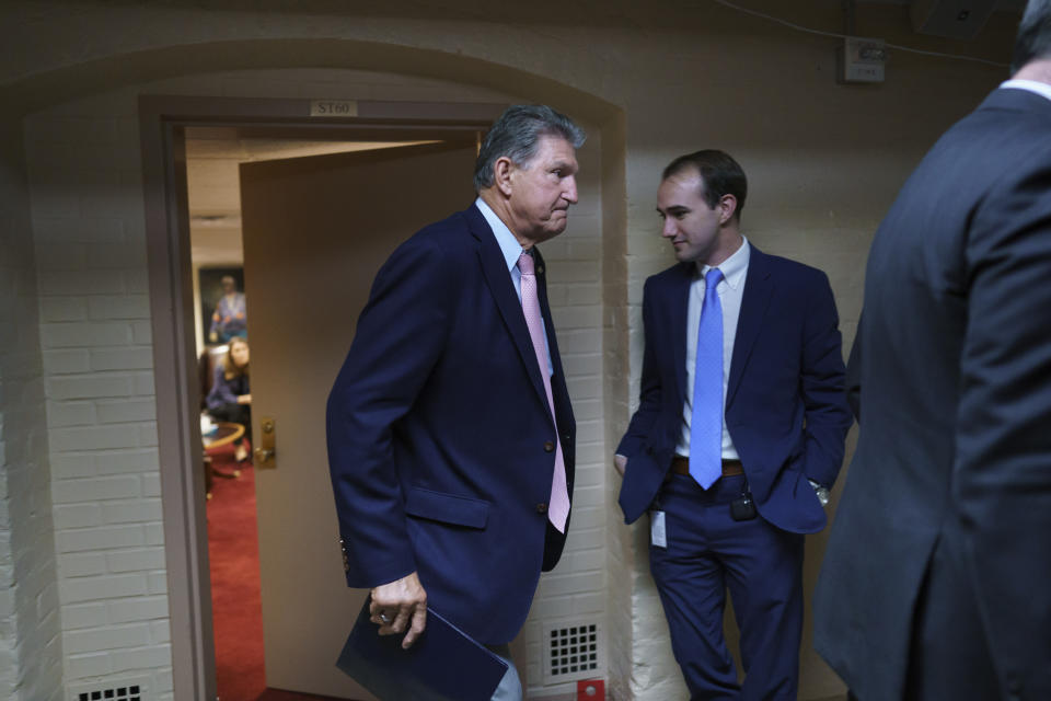 Sen. Joe Manchin, D-W.Va., a key infrastructure negotiator, emerges after working behind closed doors with other Democrats in a basement room at the Capitol in Washington, Wednesday, June 16, 2021. (AP Photo/J. Scott Applewhite)