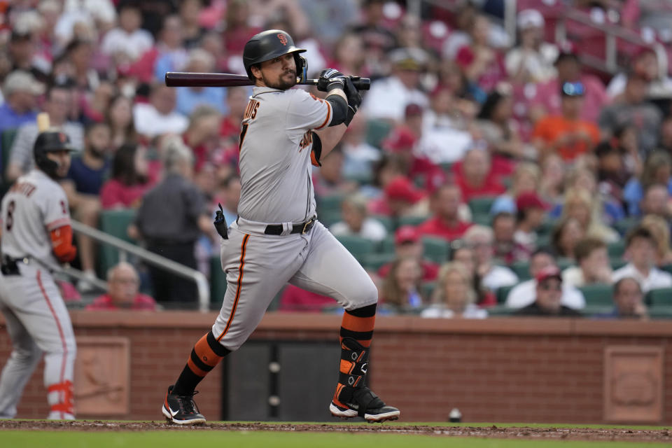 San Francisco Giants' J.D. Davis singles during the third inning of a baseball game against the St. Louis Cardinals Tuesday, June 13, 2023, in St. Louis. (AP Photo/Jeff Roberson)