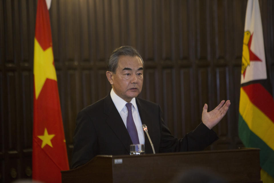 China's Foreign Minister Wangi Yi addresses a joint press conference with Zimbabwe's Foreign minister Sibusiso Moyo in Harare, Zimbabwe, Sunday, Jan, 12, 2020. Wangi Yi is in Zimbabwe as part of a five nation tour of Africa that seeks to promote the Asian economic and political interests on the continent.( AP Photo/Tsvangirayi Mukwazhi)