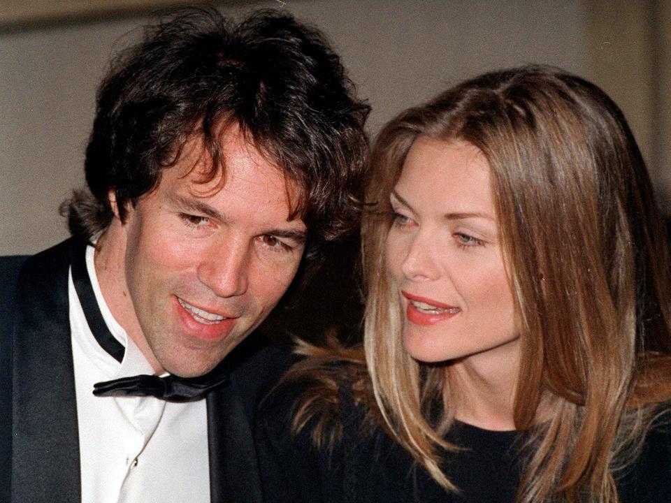 Michelle Pfeiffer with her husband, producer David E. Kelley, circa 1995