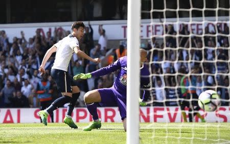 Britain Football Soccer - Tottenham Hotspur v Watford - Premier League - White Hart Lane - 8/4/17 Tottenham's Son Heung-min scores their fourth goal Reuters / Dylan Martinez Livepic