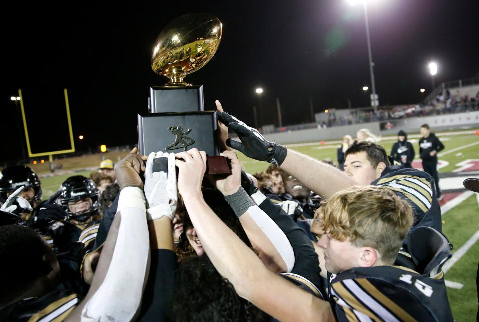 Tipton celebrates the Class C football state championship over Waynoka at Southern Nazarene University in Bethany, Okla., Friday, Dec. 2, 2022.