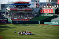 <p>Members of the Republican team pray before the Democrats and Republicans face off in the annual Congressional Baseball Game at Nationals Park in Washington, June 15, 2017. (Photo: Joshua Roberts/Reuters) </p>