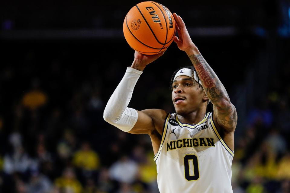 Michigan guard Dug McDaniel (0) makes a pass against Toledo during the first half of the first round of the NIT at Crisler Center in Ann Arbor on Tuesday, March 14, 2023.