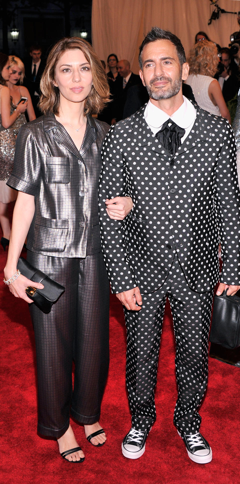 <p>The director arrived on the arm of designer Marc Jacobs at the 2013 Met Gala in a pair of silvery silk pajamas (shop a similar look <a rel="nofollow noopener" href="http://www.neimanmarcus.com/Christine-Designs-MIDSUMMER-LONG-GOWN/prod198760220/p.prod?" target="_blank" data-ylk="slk:here;elm:context_link;itc:0;sec:content-canvas" class="link ">here</a>). </p>