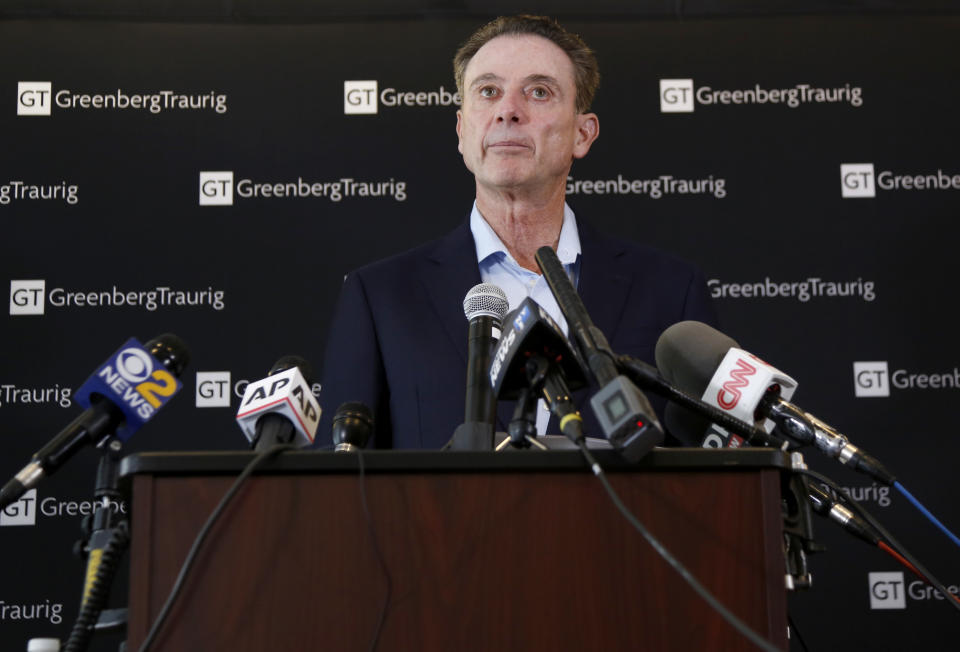 Former Louisville basketball coach Rick Pitino talks to reporters during a news conference in New York, Wednesday, Feb. 21, 2018. Pitino held the news conference in the wake of an NCAA decision in a sex scandal case that strips the Cardinals program of 123 victories, a national championship and $600,000 in postseason revenue. (AP Photo/Seth Wenig)