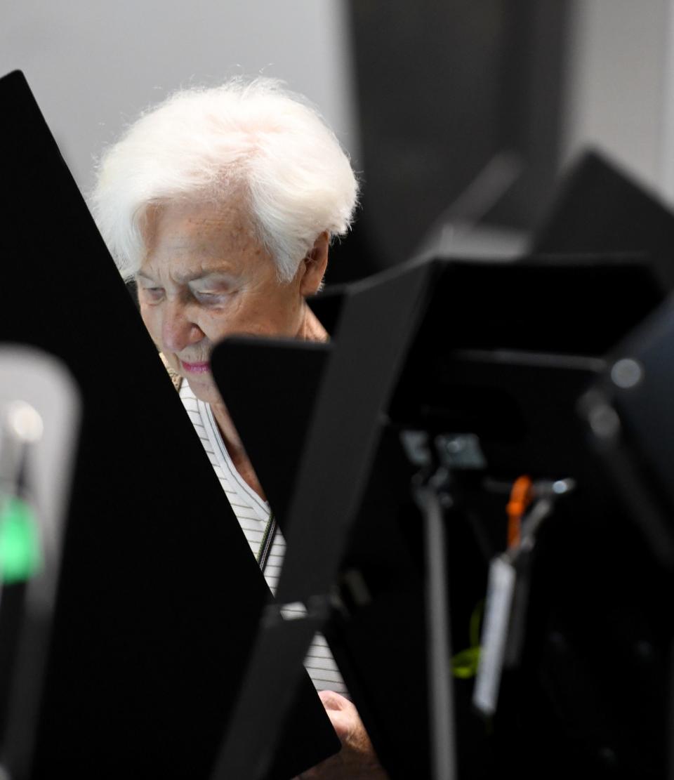 Anna McNulty votes in a special election in August at the Woodlawn Church polling location in Jackson Township.