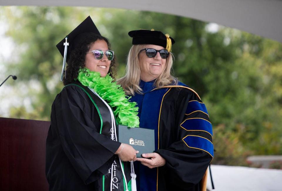 Cuesta College held its 59th commencement ceremony at the San Luis Obispo campus on Friday, May 17, 2024. Jennalynn Batalla, a liberal arts, social and behavioral sciences graduate, poses for a photos with Cuesta College superintendent Jill Stearns.