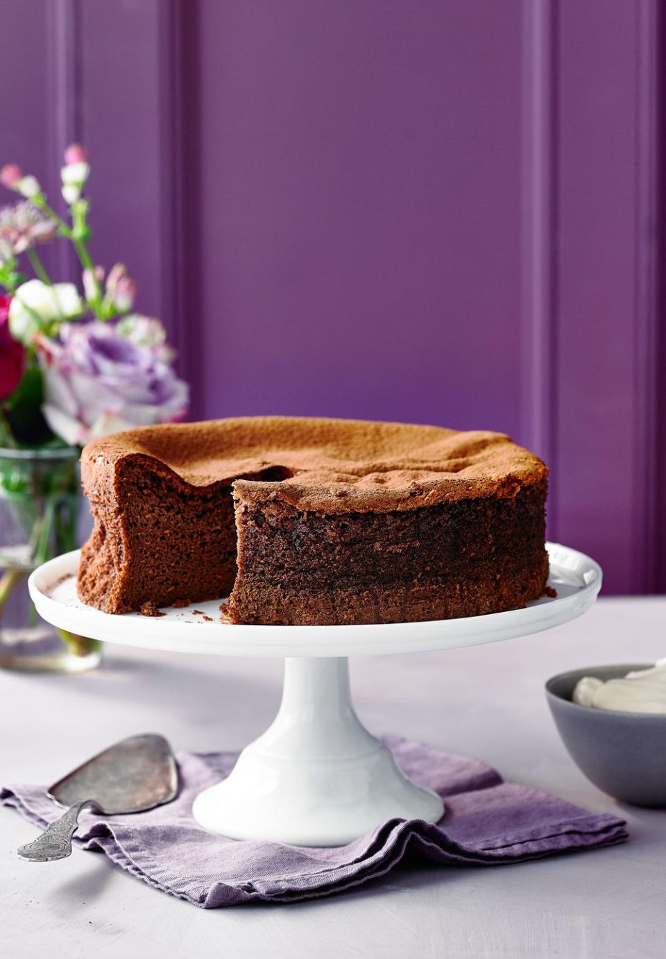 <p>This light cake is like a set mousse – you can even hear the bubbles pop as you slice it! We recommend using Green & Black’s chocolate, as it has the right percentage of cocoa solids.</p><p><strong>Recipe: <a href="https://www.goodhousekeeping.com/uk/food/recipes/a26943110/three-ingredient-chocolate-cake/" rel="nofollow noopener" target="_blank" data-ylk="slk:Three-ingredient Chocolate Cake;elm:context_link;itc:0;sec:content-canvas" class="link ">Three-ingredient Chocolate Cake</a></strong></p>