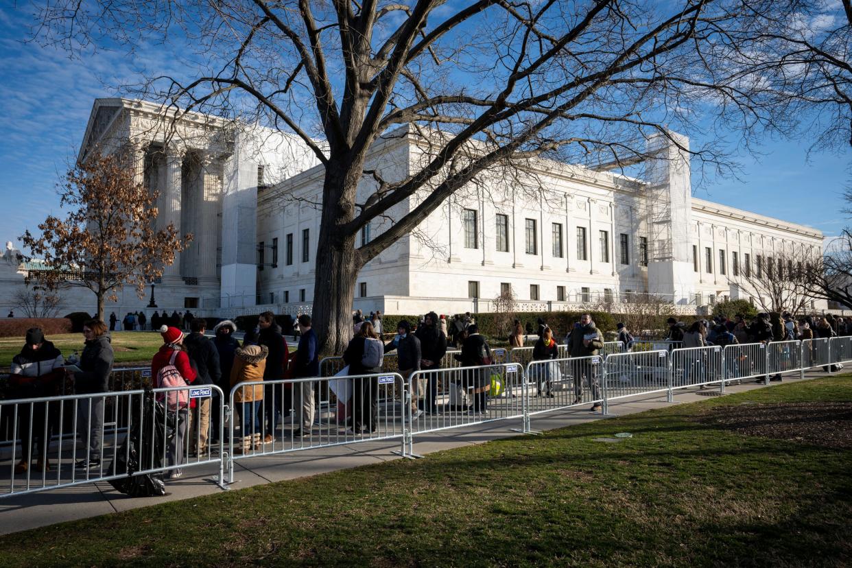 People line up outside the U.S. Supreme Court in hopes of attending the debate over a ruling by a Colorado court that barred former President Donald Trump from appearing on the state’s Republican primary ballot due to his role in the Jan. 6, 2021, attacks on the U.S. Capitol..