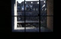 A view of Rome's ancient Colosseum January 18, 2013. Italian restorers cleaning the Colosseum have discovered remains of frescoes indicating the interior of one of the world's most famous monuments may have been colourfully painted in Roman times. REUTERS/Tony Gentile (ITALY - Tags: TRAVEL SOCIETY)