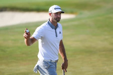 Jun 17, 2018; Southampton, NY, USA; Dustin Johnson reacts on the eighteenth green after completing the final round of the U.S. Open golf tournament at Shinnecock Hills GC - Shinnecock Hills Golf C. Shanna Lockwood-USA TODAY Sports