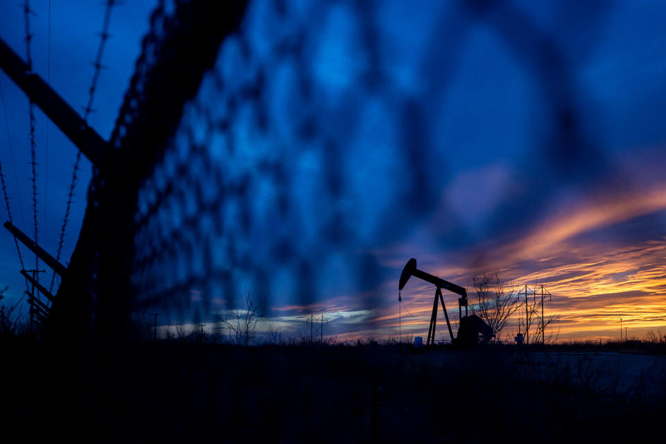 A pump jack operates during a sunset on March 7, 2022, in south Ector County, Texas. Oil prices rose sharply in response to Russian's invasion of Ukraine.<span class="copyright">Jacob Ford—Odessa American/AP</span>