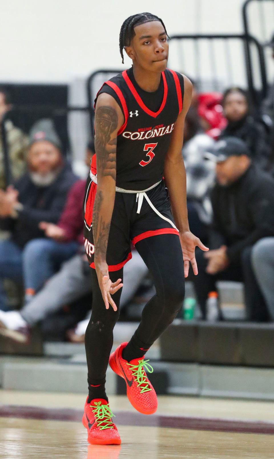 William Penn's Jaylin Horsey reacts to a third-period three pointer in William Penn's 72-66 win at Appoquinimink, Thursday, Jan. 4, 2023.